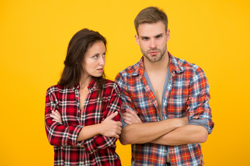 problems in relationship. couple break up. family psychology. man and woman checkered shirt. serious students yellow background. lets talk. misunderstanding in relations. this is conflict crisis