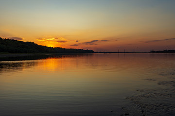Fototapeta na wymiar Amazing sunset over the river