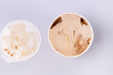 Opened Ice Cream Bucket Tasty Ice Cream With Caramel Top View Horizontal