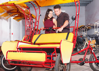 Couple planning to hire velotaxi