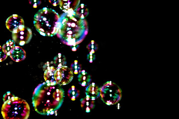 Soap bubbles in black background