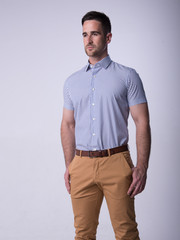 Fototapeta premium young man in blu shirt and jeans