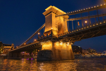 Naklejka premium Budapest Hungary Chain Bridge at Night from Danube River