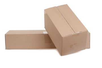 two cardboard boxes on white background