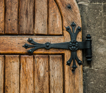 Antique castle wood door with iron elements