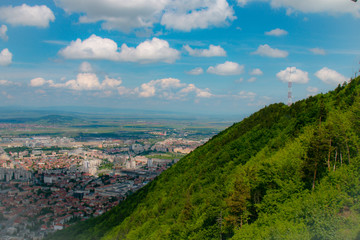 Fototapeta na wymiar Aerial mountain view of the town Brasov, Romania