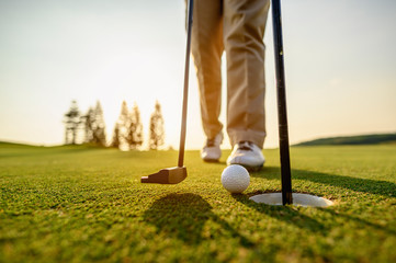 lifestyle, golf, activity, outdoor, sport, golfer concept. Golf balls that are going to be hole by...