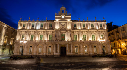 Fototapeta na wymiar CATANIA, ITALY - APRIL 8, 2018:The facade of University at dusk.