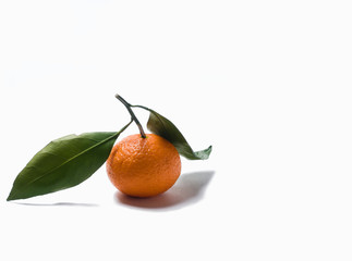 tangerine with leaves isolated on white background