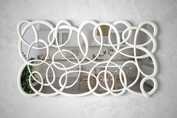 Modern twisted shape mirror hanging on the wall reflecting interior design scene, bright kitchen and dining room with chairs, retro white architecture, architect designer concept idea