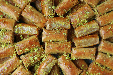 Top View of Baklava Pastries Topped with Chopped Pistachio Nuts