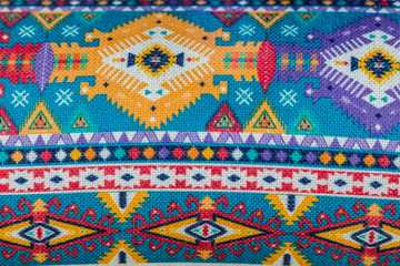 Arrière-plan tissu décoratif aux motifs colorés
