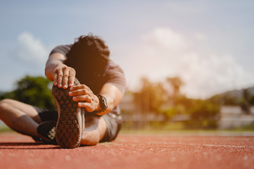 fitness, jogging, running, exercise, lifestyle and healthy concept. The young man wore all parts of...