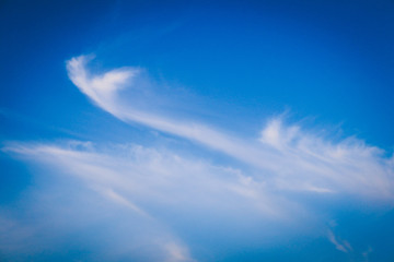 blue sky with clouds and sun