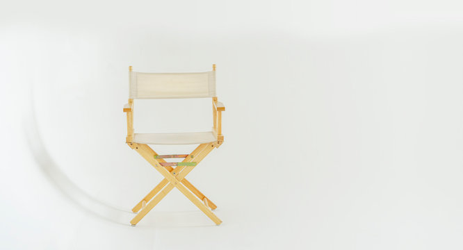 The director's chair in the white studio