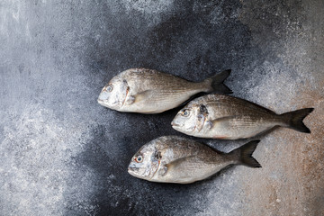 Fresh uncooked Dorado or sea bream fish