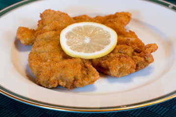 Viennese Schnitzel on an Elegant Plate with Lemon