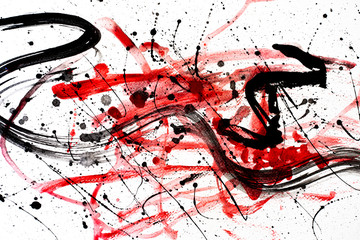 Splashing multicolored  watercolor on white paper.