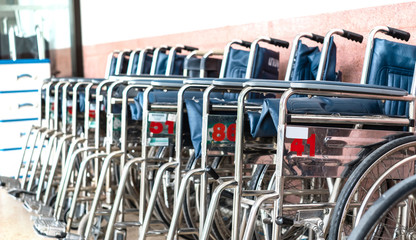 Row in line of wheelchairs in the hospital, wheelchairs to be served for patient services.