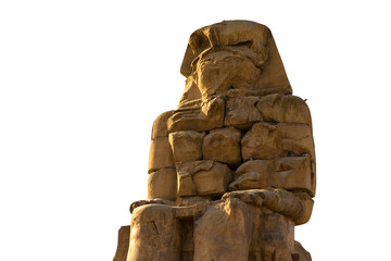 Colossi of Memnon Luxor Thebes against the background of dawn in the Egypt	