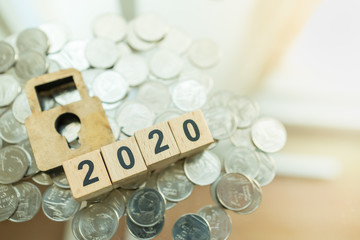 2020 Business, Planning, Finance and Money Security Concept. Close up of Wooden number block and...