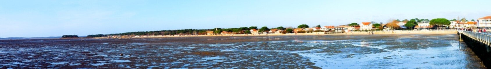 panoramic view of the town of Andernos-les-Bains and the Arcachon bay, from the pontoon, at low tide