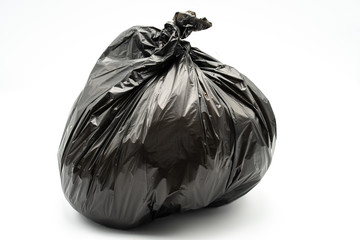 Black garbage bag isolated on white background.