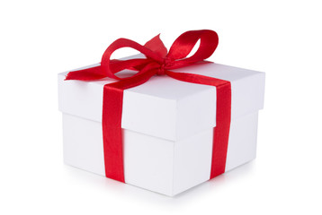 White box, bow and red ribbon isolated on white background
