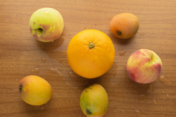 Wet orange, peaches and mangos