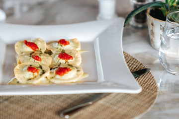 A delicious ravioli is served in a elegance restaurant or hotel
