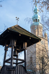 Old wooden belfry of the miners from the silver mine at the church of Piotr and Paweł in Tarowskie Góry
