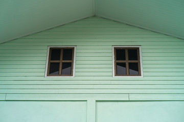 Window at green wall