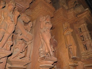 Interior, on the walls of ancient Kama Sutra temples in India kajuraho. UNESCO world heritage site....