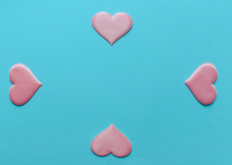 Valentine's Day background. A pink  heart  on blue background, flat lay minimal concept, trendy pop art style photo. Valentines day concept. Flat lay, top view, copy space