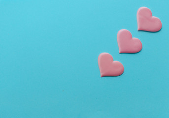Valentine's Day background. A pink  heart  on blue background, flat lay minimal concept, trendy pop art style photo. Valentines day concept. Flat lay, top view, copy space