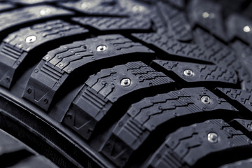 Winter tires for the car. Radial tread, thin lamellas and metal spikes.
