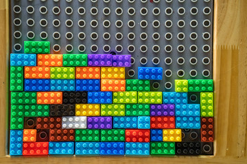 Plastic building blocks at playground.