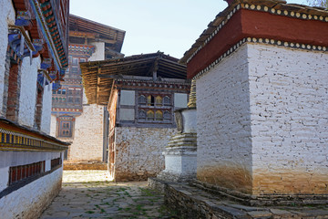 Fototapeta na wymiar Courtyard, traditional houses in Ogyen Choling, Bhutan. 