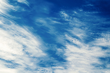 Beautiful clouds on a background of blue sky