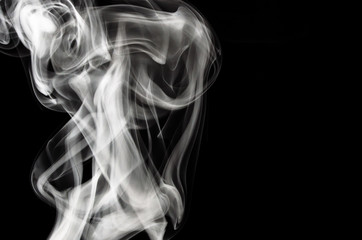 Fototapeta premium Nature Abstract: The Delicate Beauty and Elegance of a Wisp of White Smoke