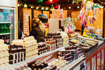 London, UK/Europe; 20/12/2019: Christmas stall with chocolates, candy and sweets at the Christmas...