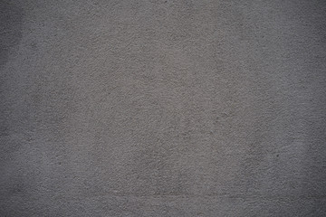 Grey plaster wall background.