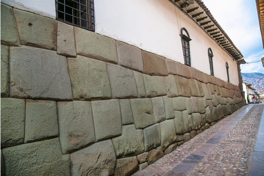 Historic Colonial Buildings in Hatun Rumiyoc street , Cusco,  Peru.