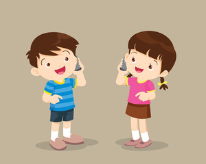 boy and girl talking on the cell phone