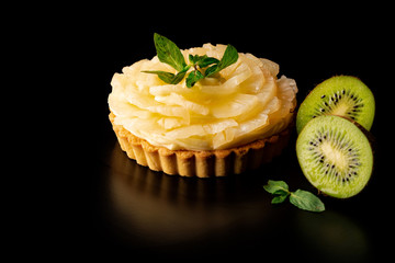 Pineapple tart isolated on black background