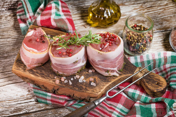 Beef tenderloin steaks wrapped in bacon.