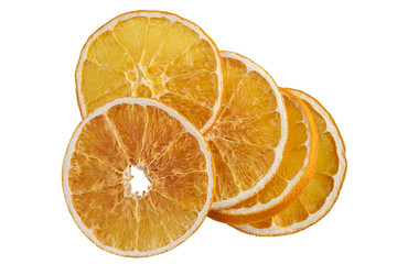 Stack of dried orange slices isolated on white