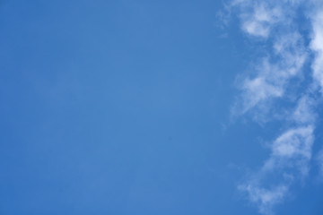 Tiny clouds against blue sky.