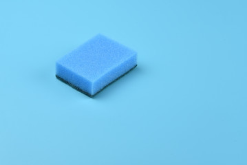 Sponge for washing dishes on the desk