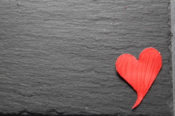 red heart or hearts on a black or dark gray background